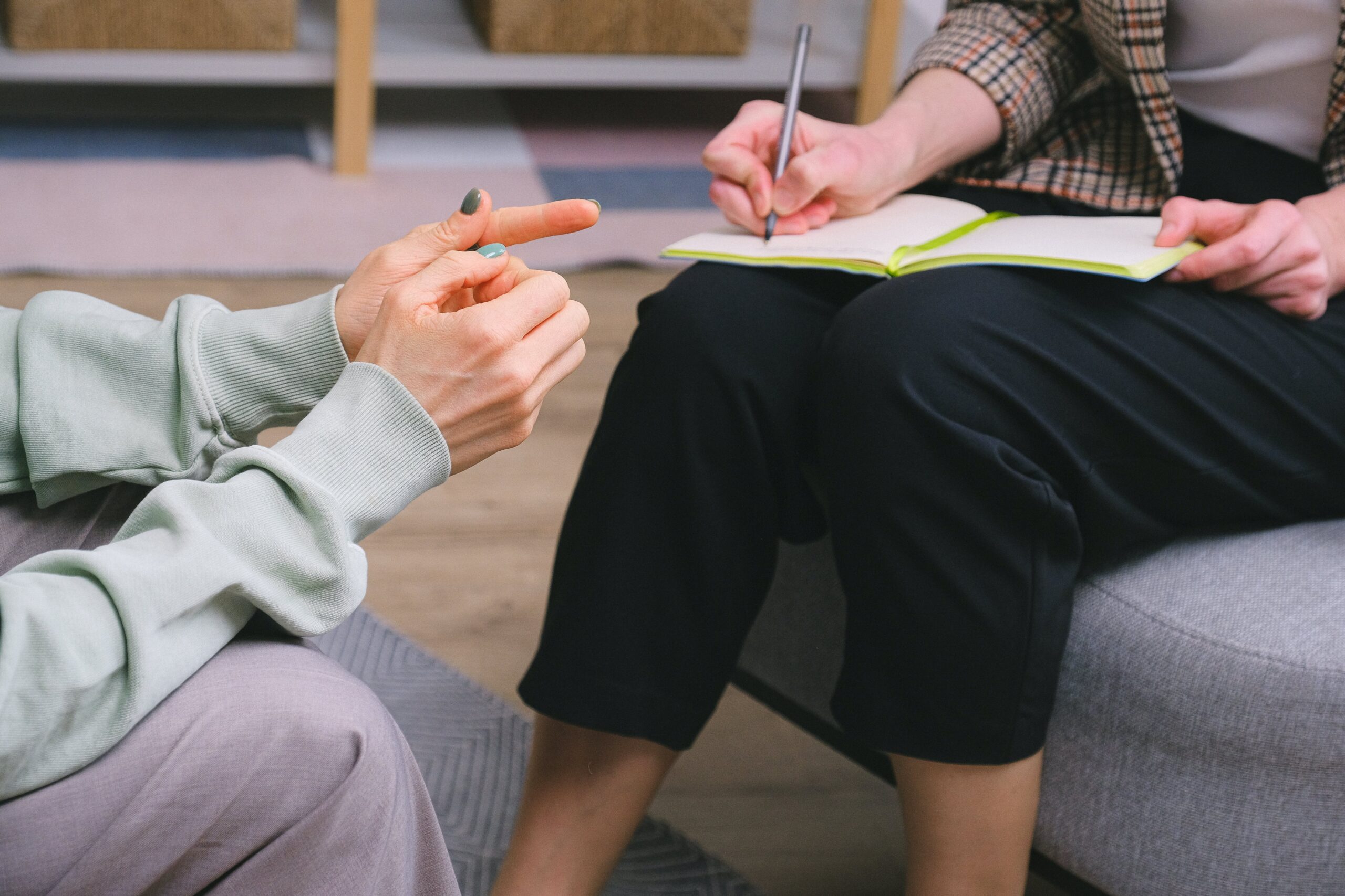 A manager sits down with an employee to discuss their stress and how the organisation can support them. 
